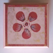 Pink flower painted on top of small pink box