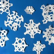 Photo of paper snowflakes.