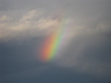 Bright Rainbow in the Clouds