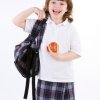 Young Girl with Backpack and Apple Ready for School