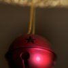 Closeup of Red Christmas Bell Ornament