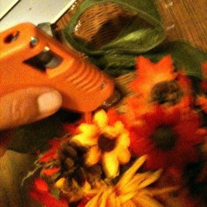 Flowers being glued to Cornucopia