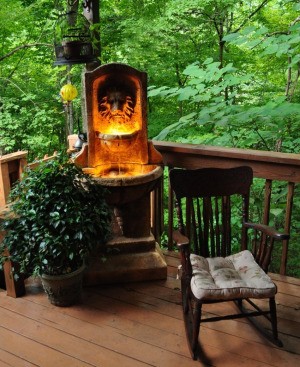 Garden Deck with Lighted Lion Fountain in Corner