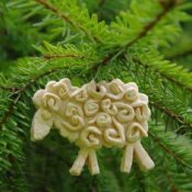 A salt dough ornament on a Christmas tree.