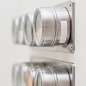 Spice rack with magnetic canisters.