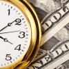 Saving Money vs. Saving Time, Watch Sitting on Top of Dollar Bills