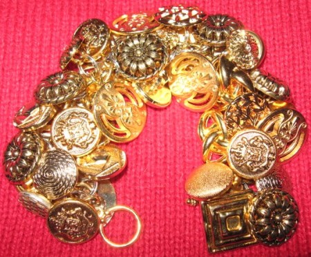 Gold button bracelet.
