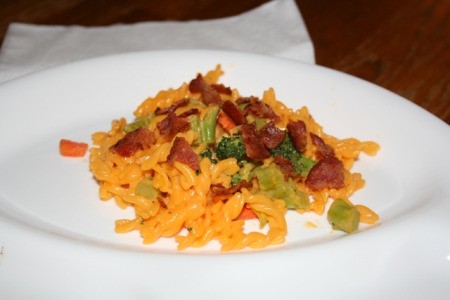 Mac and cheese with added carrots, broccoli, and bacon.