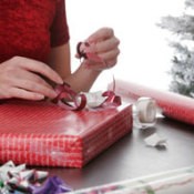 photo of someone wrapping a present