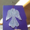 Photo of an angel craft made form used dryer sheets.