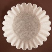 Uses for Coffee Filters, Coffee filter on a brown background.