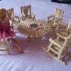 Doll furniture made out of clothespins.