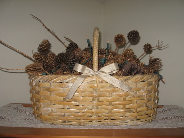 Basket with pinecones and twigs