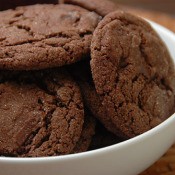 A bowl of chocolate and berry cookies.
