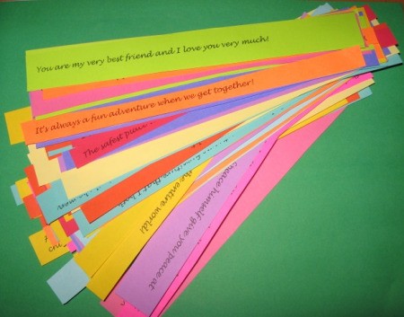 Multicolored cut memory papers cut and fanned out.