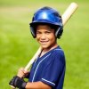 A young boy in a baseball uniform.
