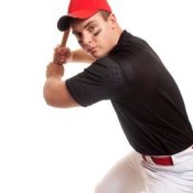 Removing Pine Tar from Baseball Pants. Baseball Player with Bat on White Background