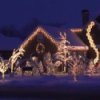 Best Christmas Light Shows. House decorated in white Christmas lights