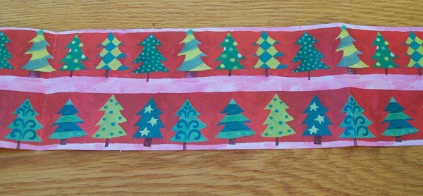 Strip of Christmas wrapping paper.