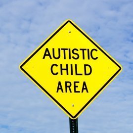 Parenting an Autistic Child, Diamond shaped traffic sign warning, autistic child area.