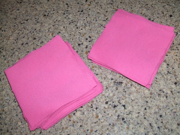 Stack of pink jersey fabric squares
