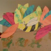 Leaves and bee at the top of the tree.