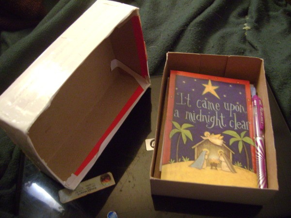 Open box with cards inside.