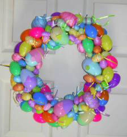 Photo of an easter egg wreath made with plastic eggs.