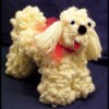 Photo of a finished dog made out of yarn.