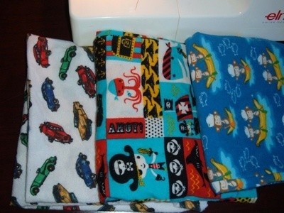Homemade pillowcases with colorful designs.