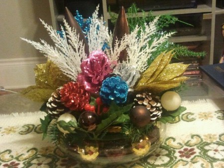 Recycled decorations arranged in bowl.