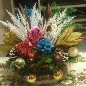 Recycled decorations arranged in bowl.