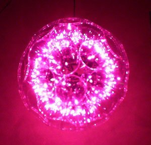 Photo of a pink sparkle ball Christmas Decoration.