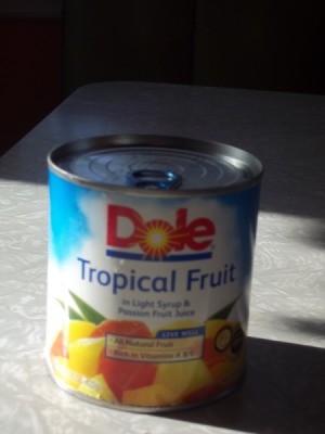 Pull top can of Dole tropical fruit.