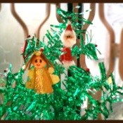 Santa and Angel Ornament on Tree