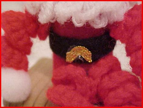 Closeup of belt and buckle.