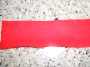 2 inch wide length of red felt.