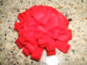 Finished rolled felt flower.