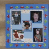 framed child's photos on scrapbook paper.
