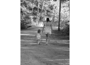 Woman and Child Walking hand in hand