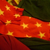 Red fleece scarf with stars.