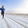 Working Out In the Winter, Man Jogging on Snowy Road