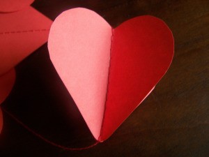 Hearts folded slightly open for 3-D effect.