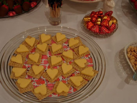 Heart Shaped Foods For Valentine's Day, A platter of heart shaped cheese slices