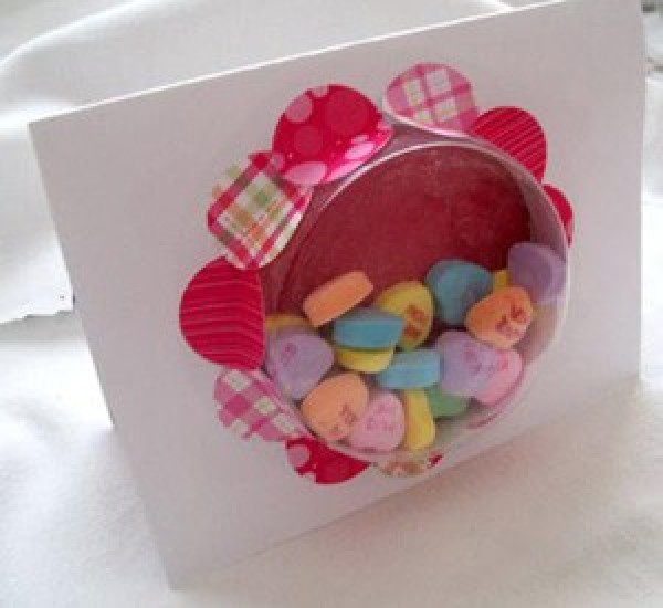 A Valentine's Day window card with candy hearts.