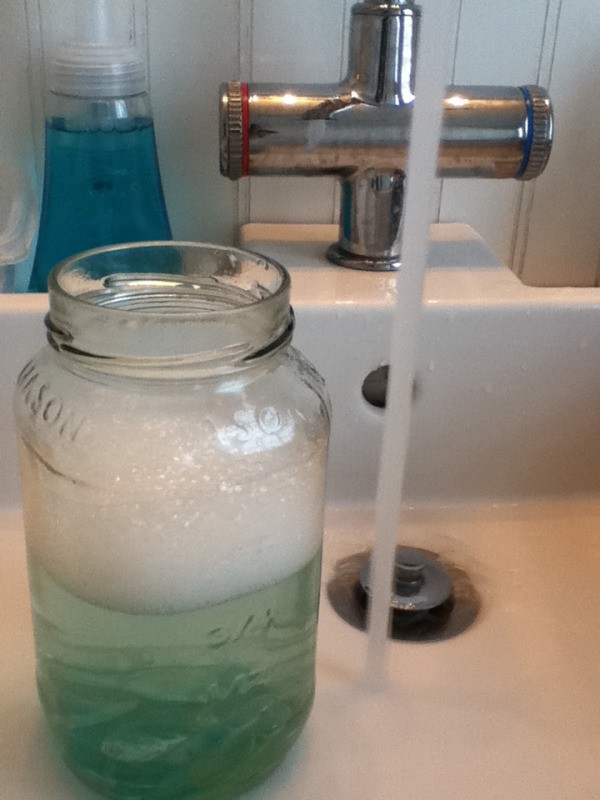 Baby wash and water in marble mason jar.