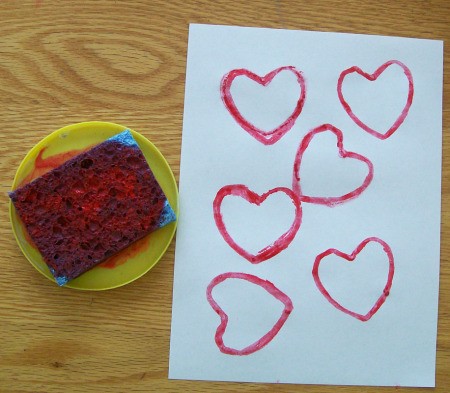 Red inked sponge and stamped paper.