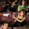 Cell Phone Etiquette, Woman on Cell Phone in Movie Theater