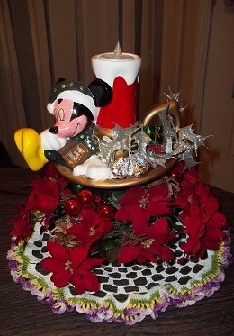 Repairing an old Mickey Christmas sculpture.