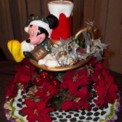 Repairing an old Mickey Christmas sculpture.